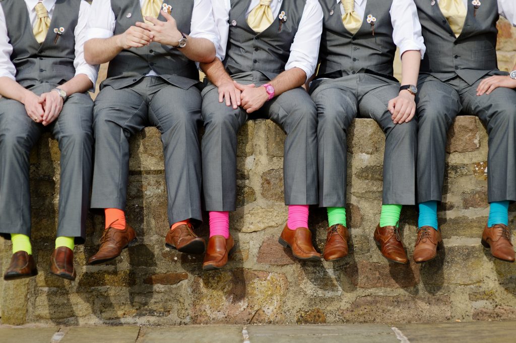 Funny colorful socks of groomsmen